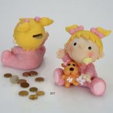 Hucha bebe sentada rosa